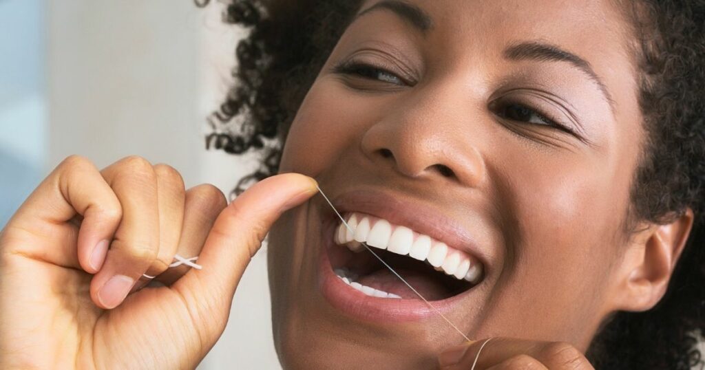 usar fio dental